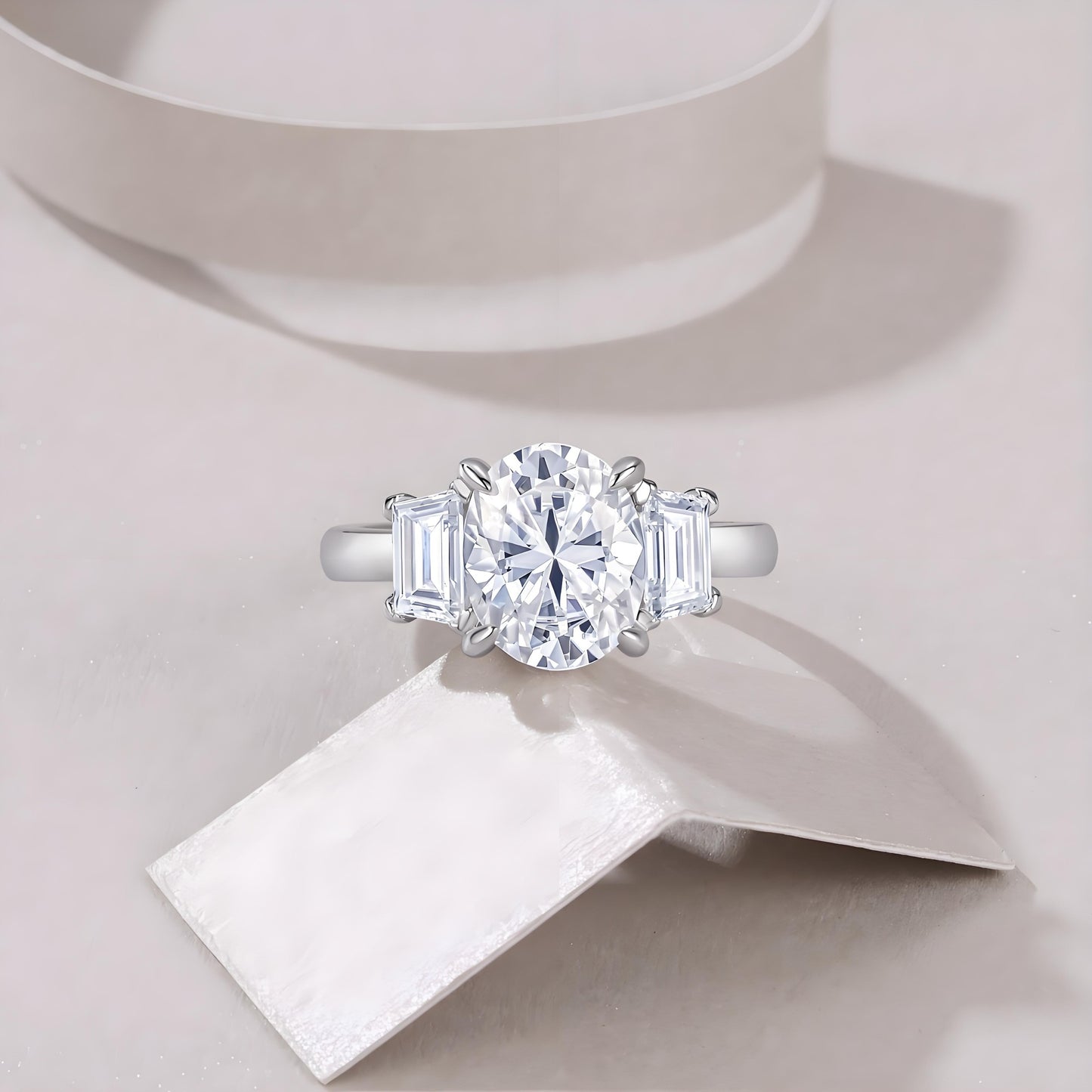 Oval Cut Moissanite Three Stone Engagement Ring with Trapezoid Side Stones (3ct. ) - La Pretti