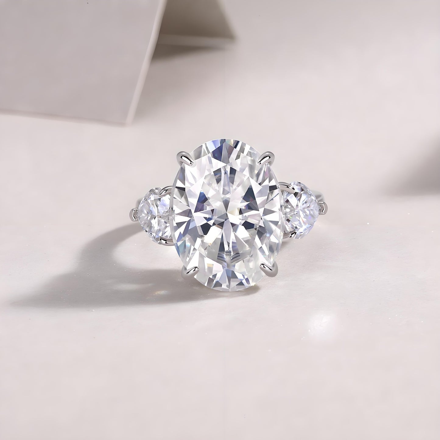 Elongated Oval Cut Moissanite Three Stone Engagement Ring with Hidden Halo in Baskets Setting (12ct. ) - La Pretti