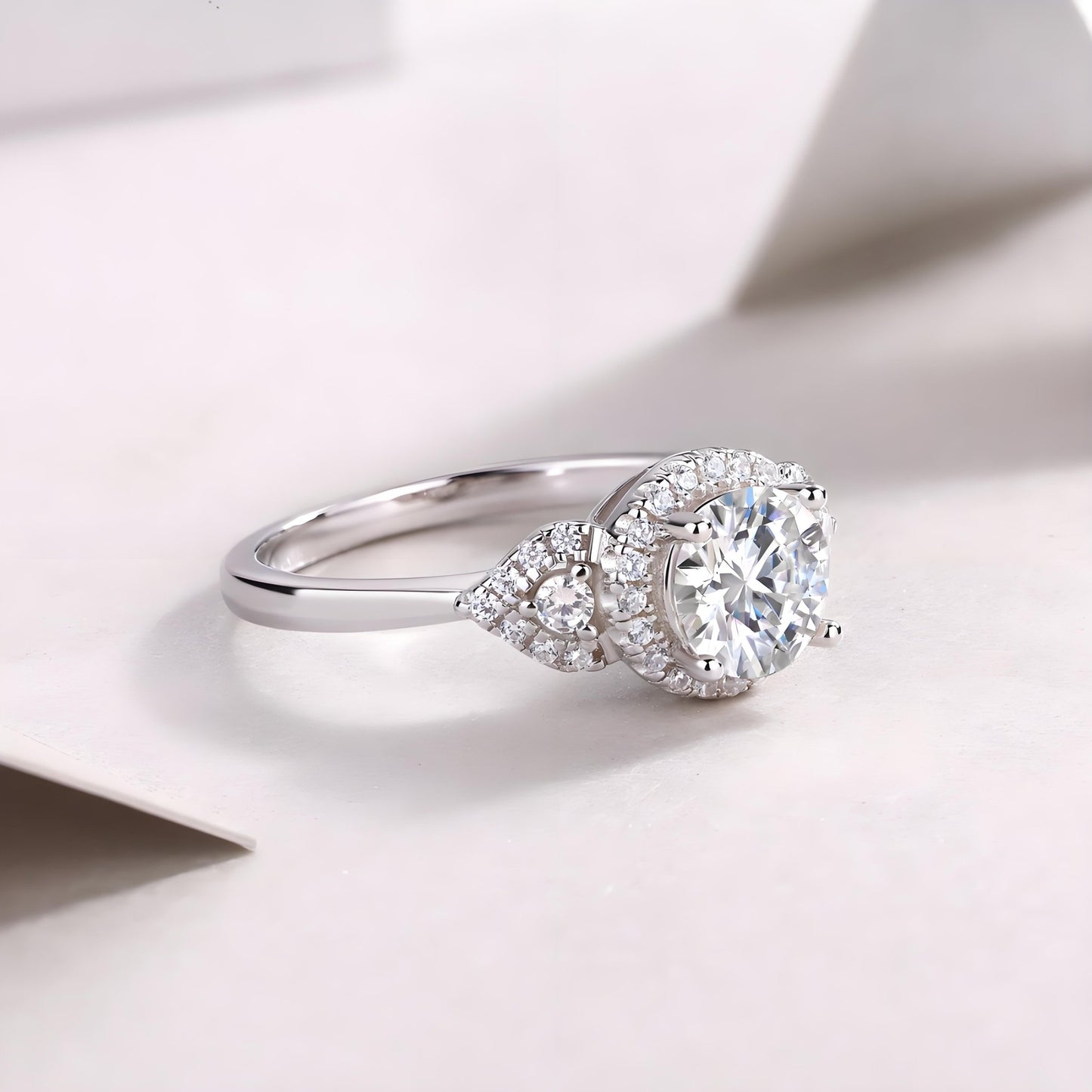 Round Halo Moissanite Three Stone Engagement Ring with Tapered Trillion Side Stones(1ct. ) - La Pretti