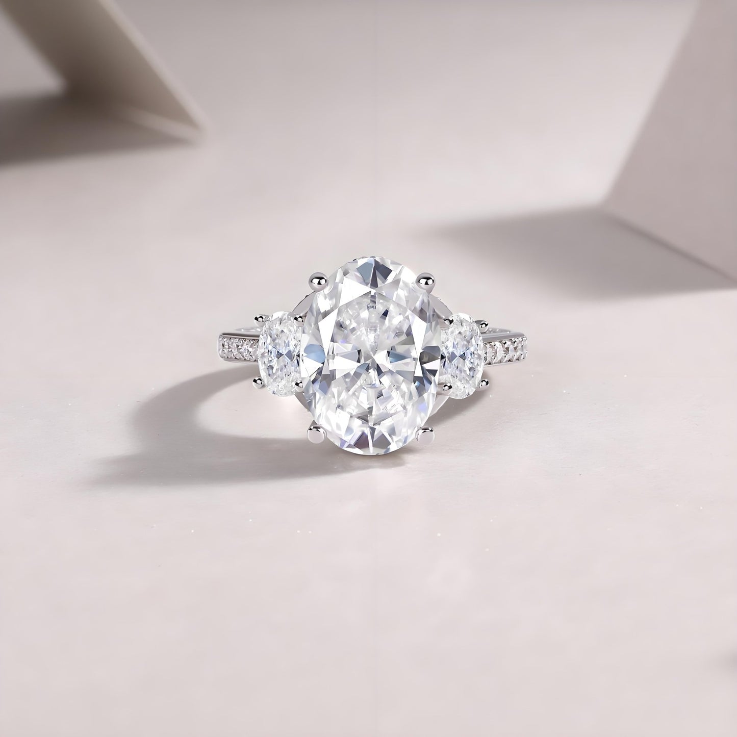 Trilogy Oval Cut Moissanite Three Stone Engagement Ring in Channel Pave Setting (10ct. ) - La Pretti