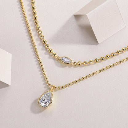 Golden Moissanite Layered Necklace of Beaded Chain with Focal Bezel Marquise Cut and Pear Shaped Pendant Set - La Pretti