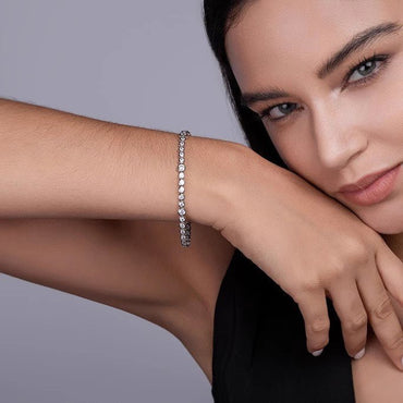 Graduated Moissanite Bezel Tennis Bracelet with Tab - inserted Clasp - La Pretti