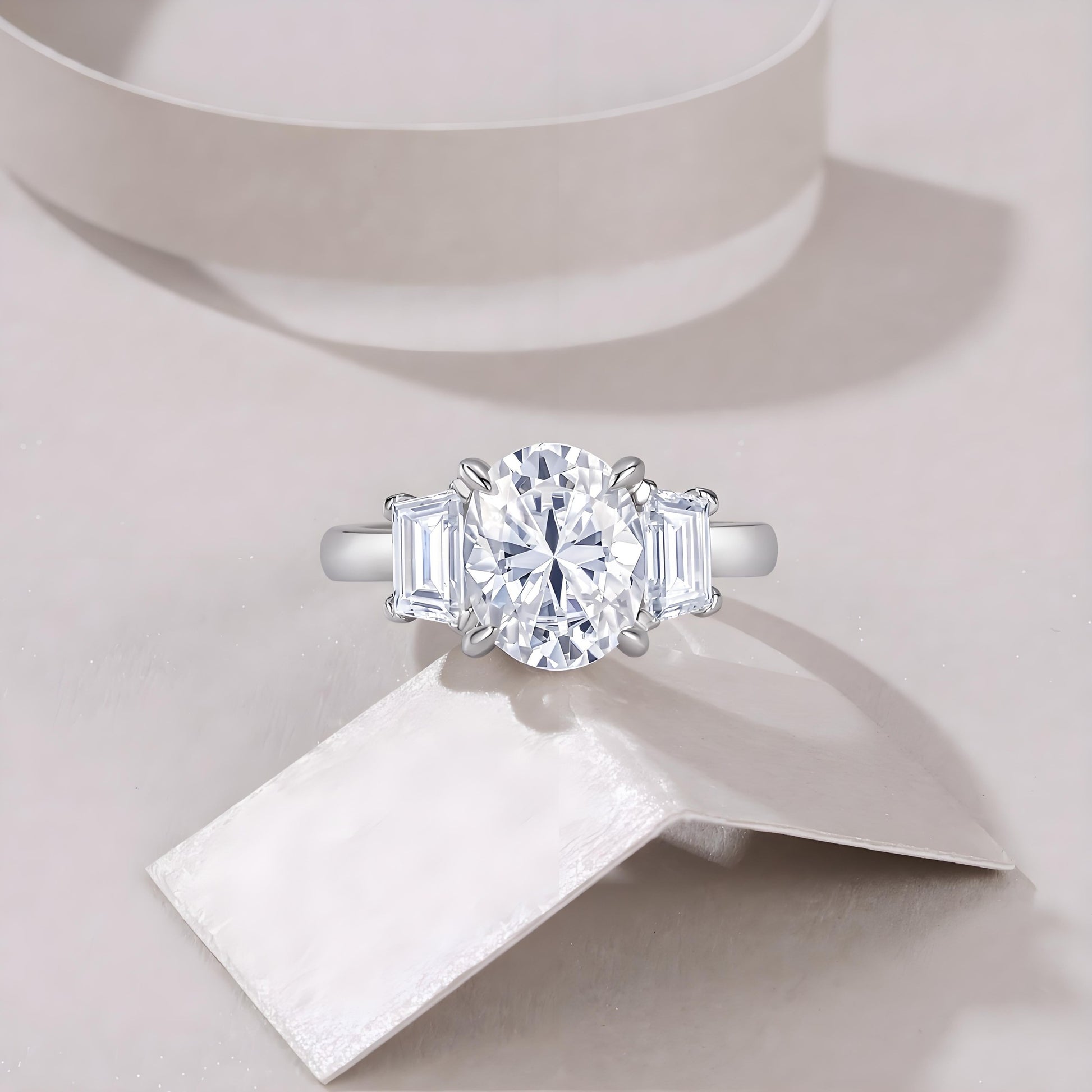 Oval Cut Moissanite Three Stone Engagement Ring with Trapezoid Side Stones (3ct. ) - La Pretti