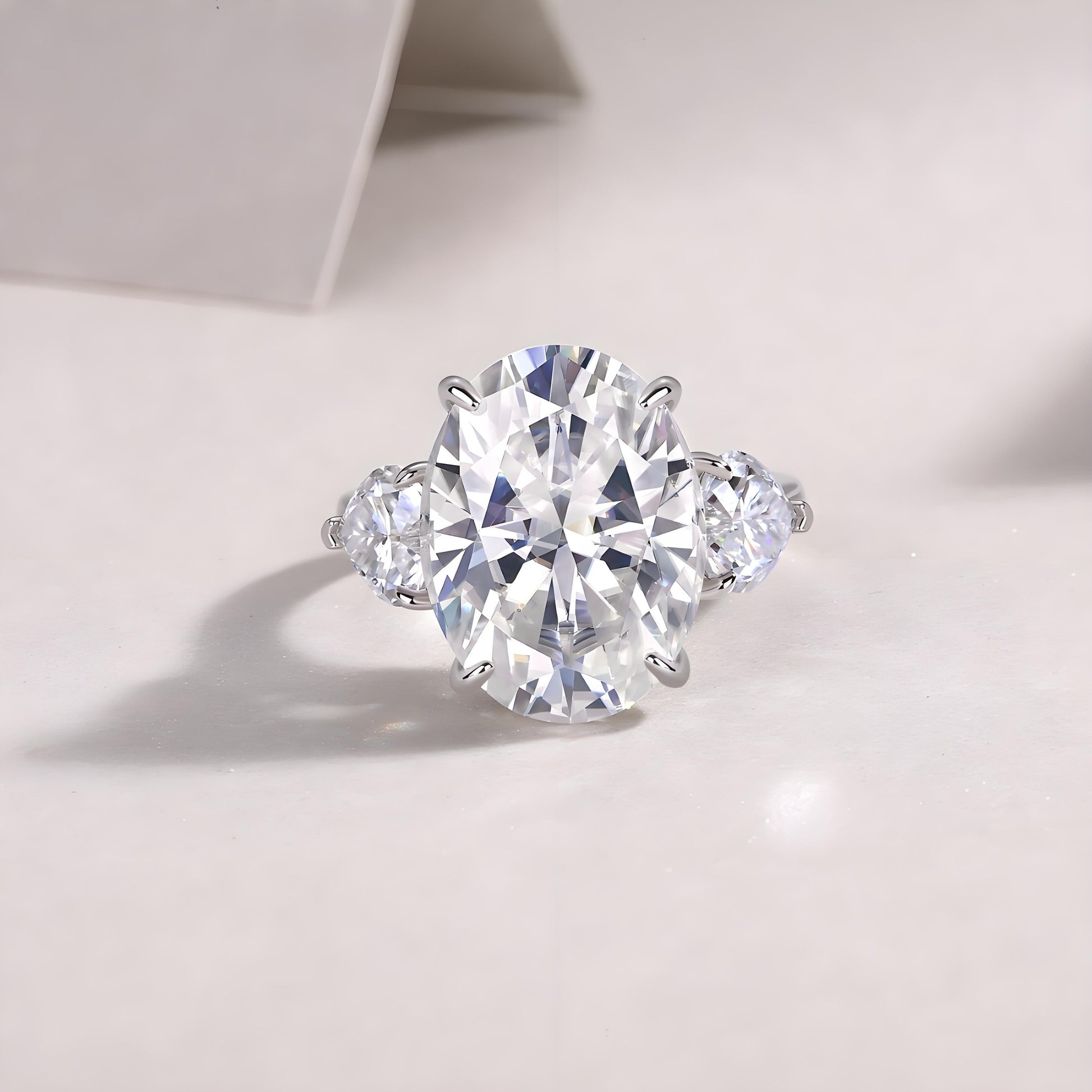 Elongated Oval Cut Moissanite Three Stone Engagement Ring with Hidden Halo in Baskets Setting (12ct. ) - La Pretti
