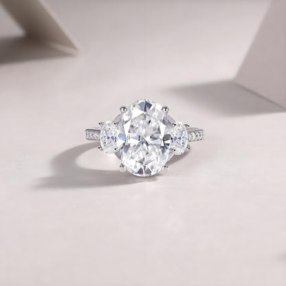 Trilogy Oval Cut Moissanite Three Stone Engagement Ring in Channel Pave Setting (10ct. ) - La Pretti