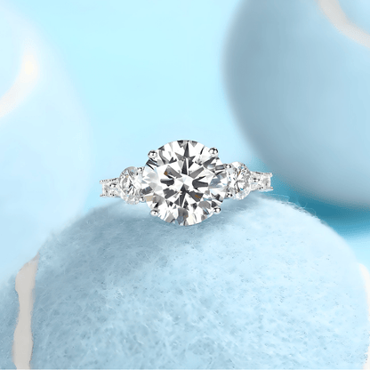 Trilogy Round Moissanite Three Stone Engagement Ring with Hidden Halo in Baskets Pave Setting (5ct. ) - La Pretti